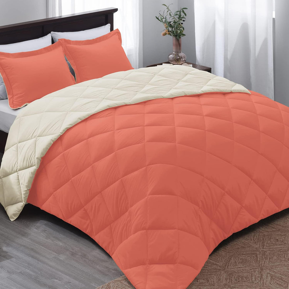 Fluffy duvet insert next to a comforter on a neatly made bed — Anna's Linens