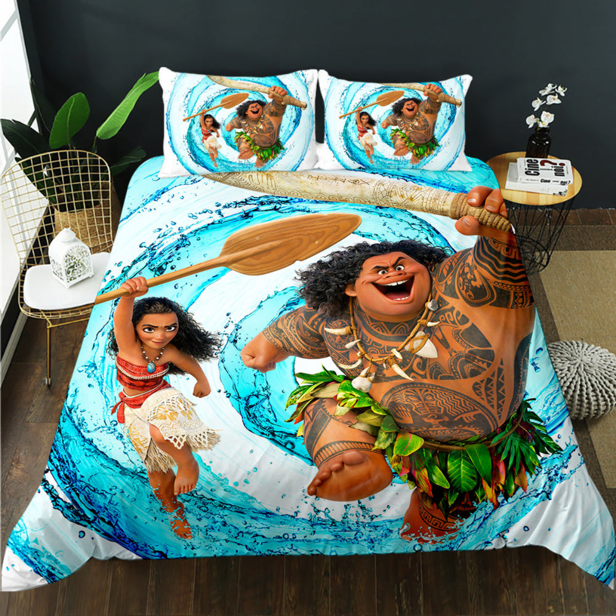 Bedding set with Moana and Maui design featuring characters holding a paddle.