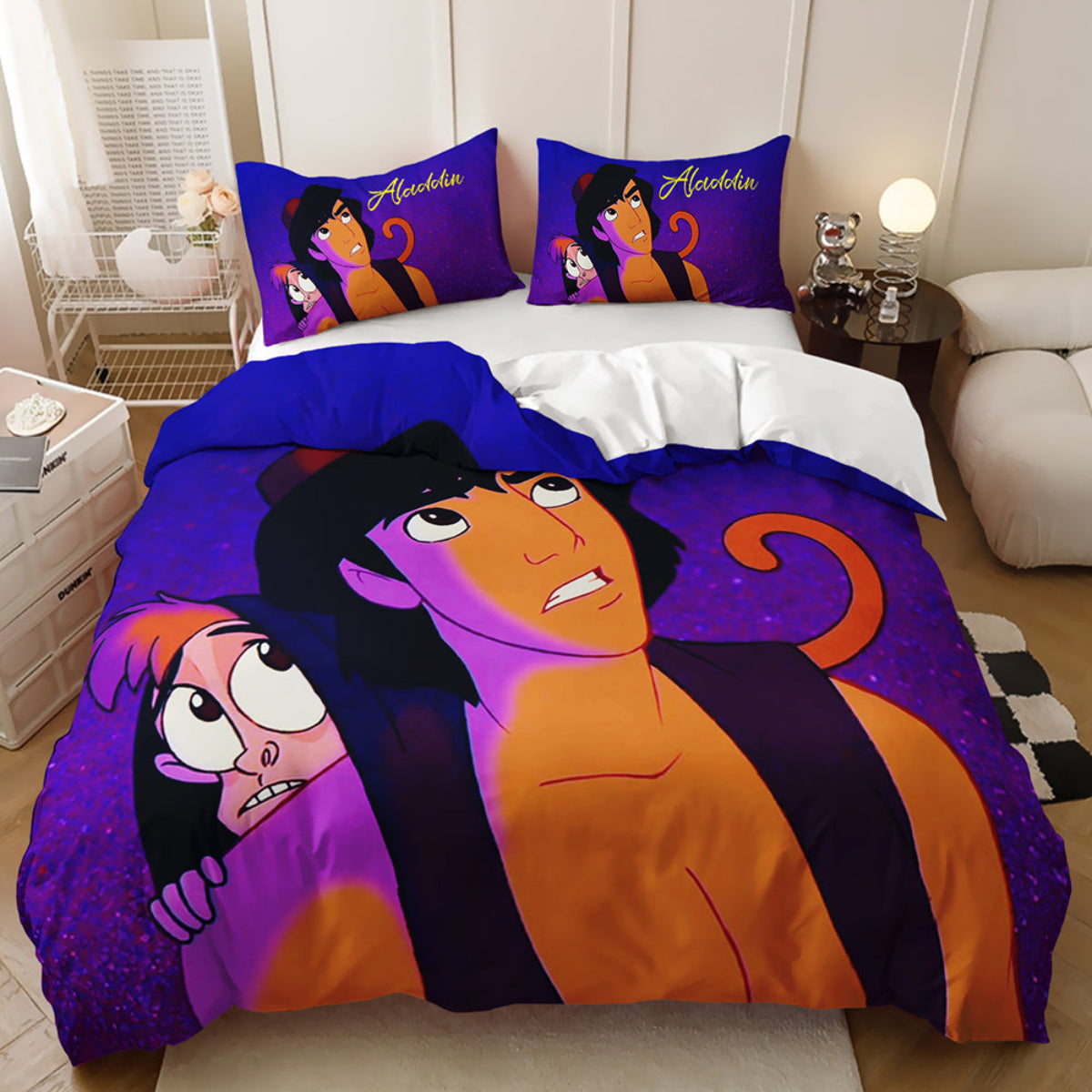 Bedding set with cartoon characters on a bed in a room.