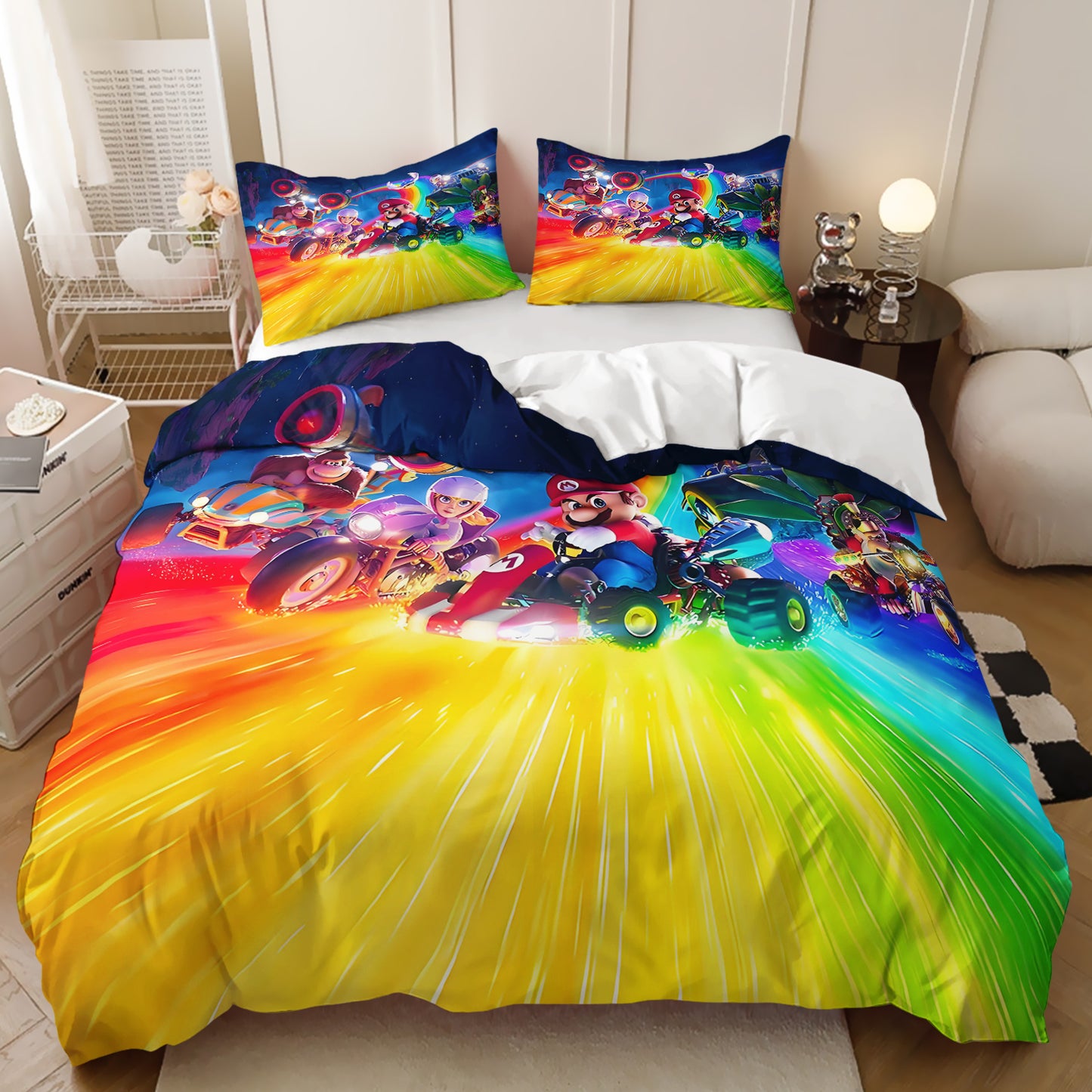 Colorful bedding set with cartoon characters on a bed in a room.