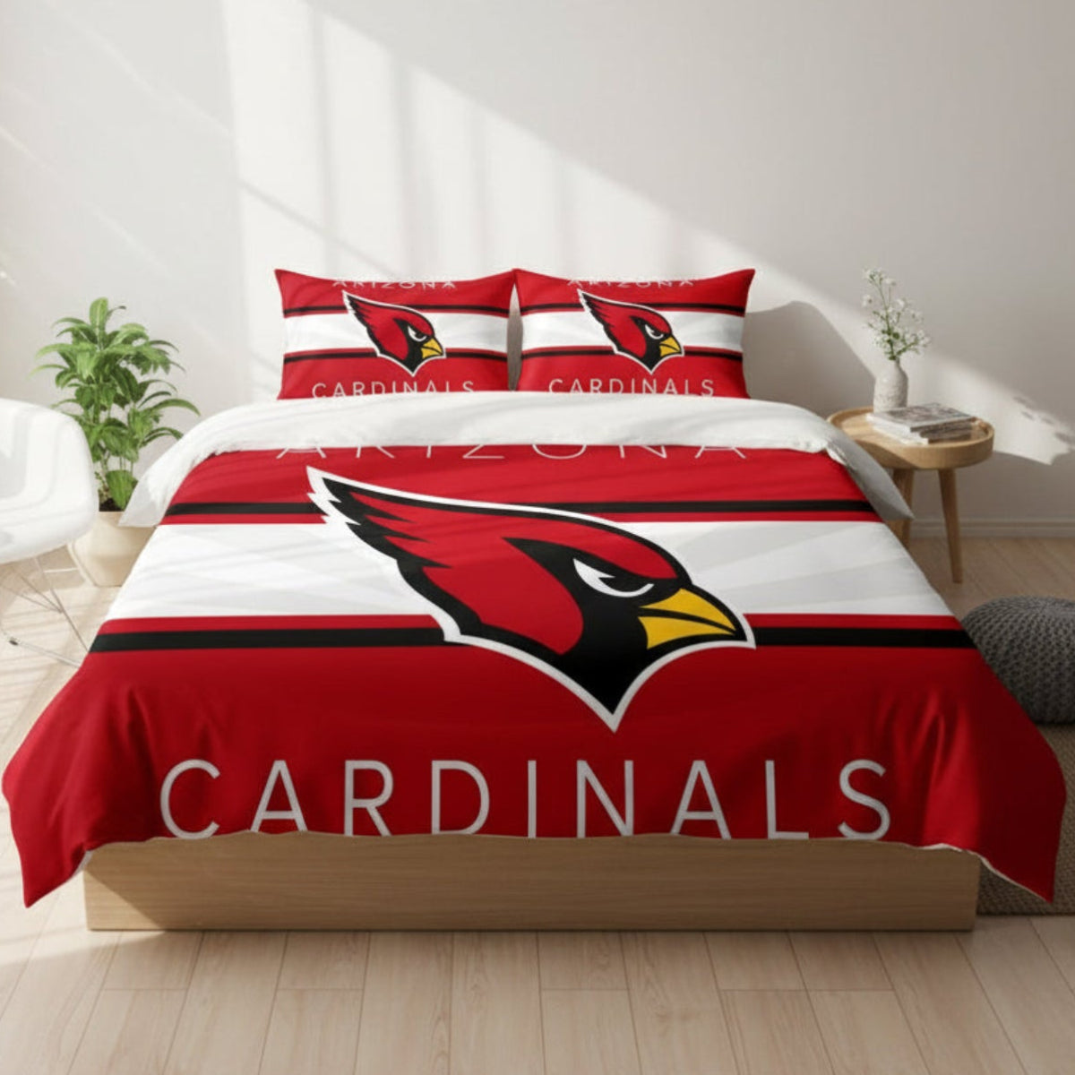 Arizona Cardinals bedding set on a bed in a room with decor elements.