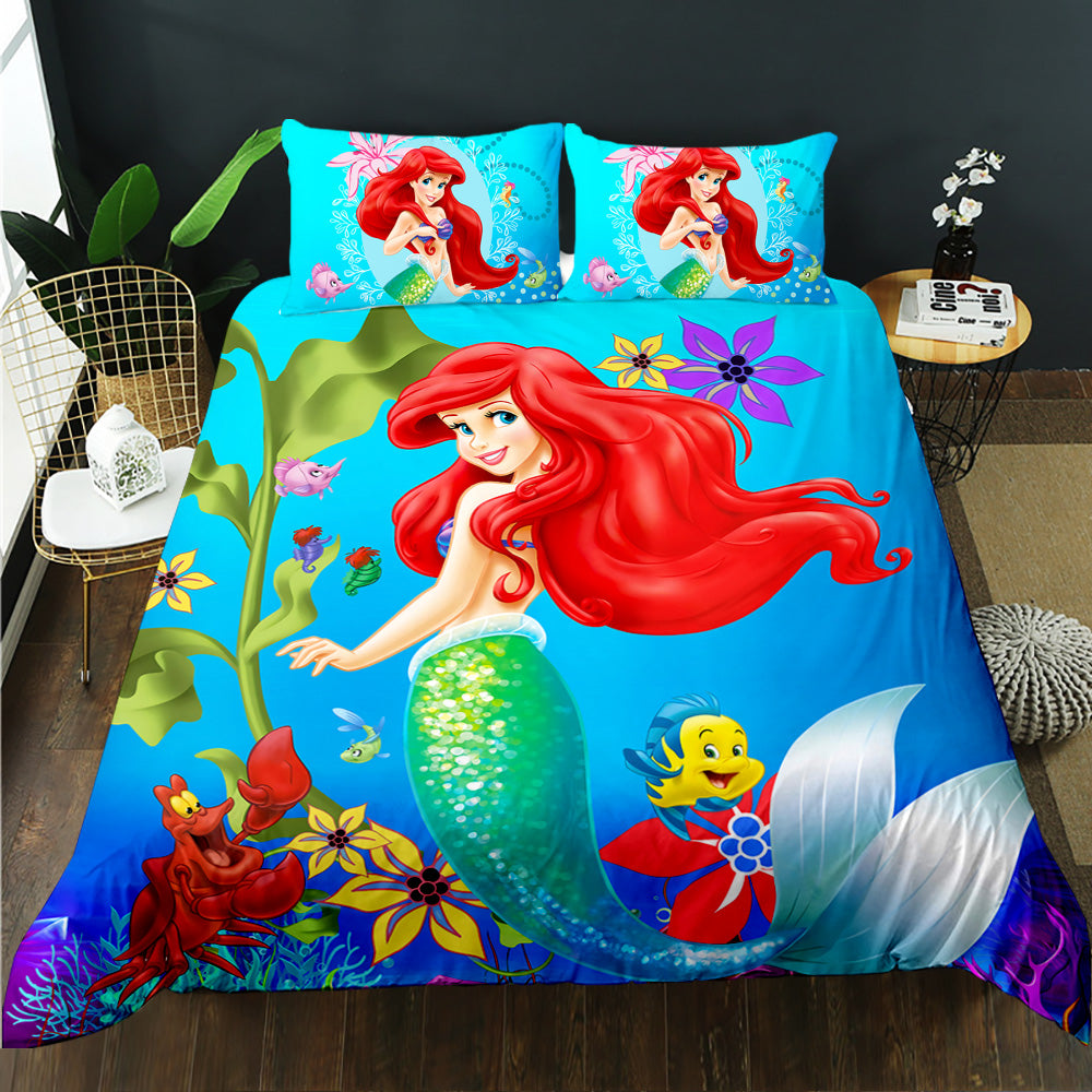Mermaid-themed bedding set with characters from a popular animated movie on a bed.